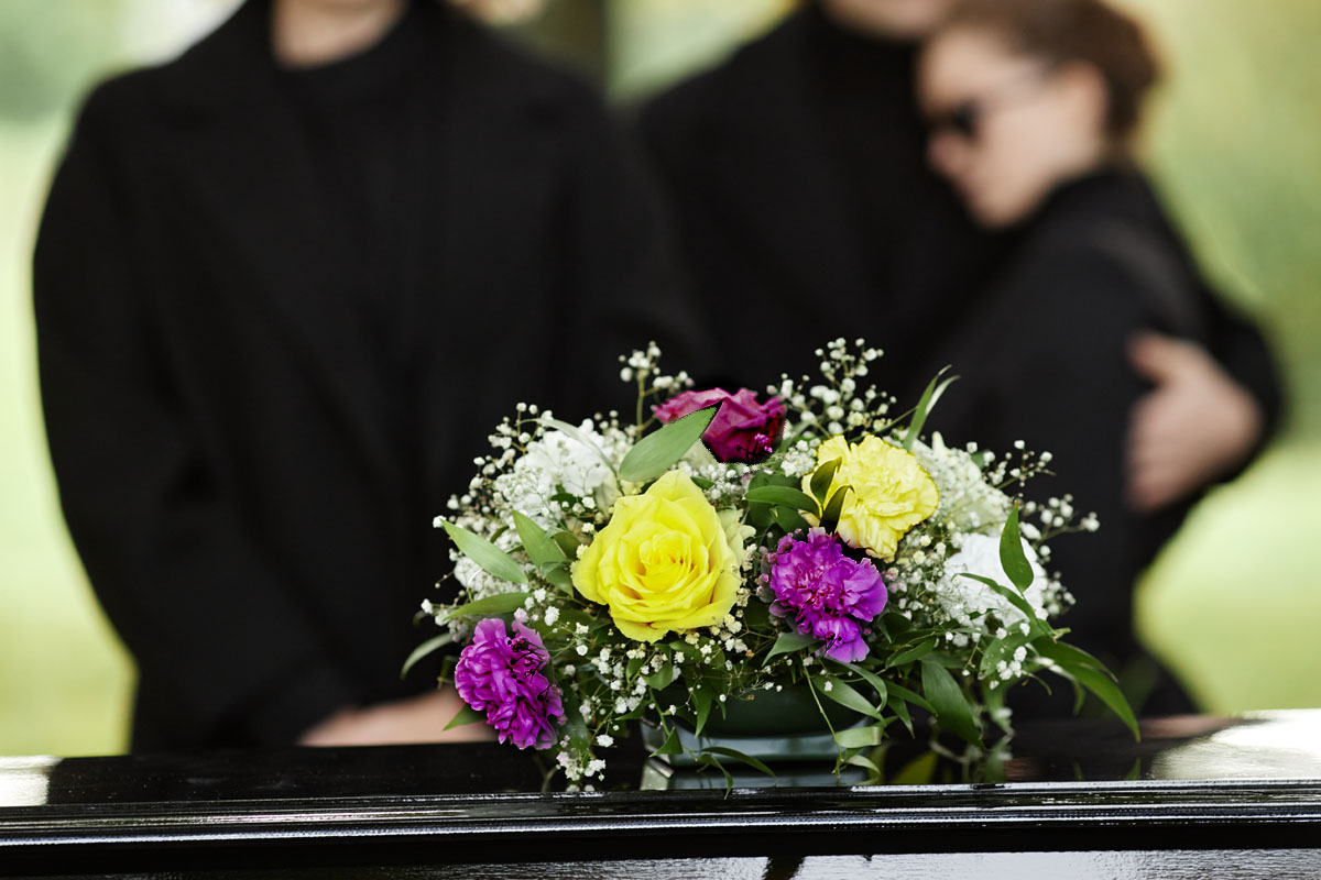 Whitmey Casket and mourners